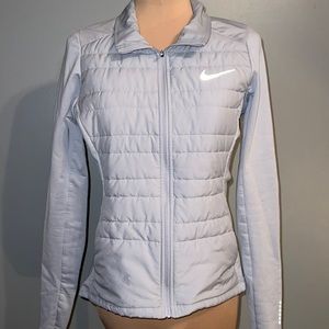 Light purple Nike Running Jacket Hidden pockets inside and outside fill zip